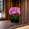 Load image into Gallery viewer, Pink Phalaenopsis Orchids – Black Vase
